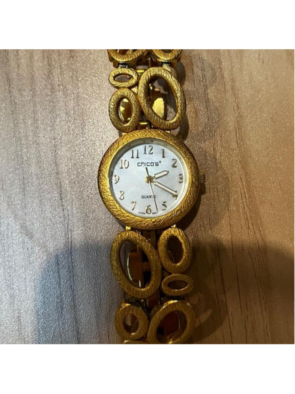 Chico’s gold-tone bracelet watch with chunky open-link design